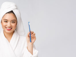 close up smile woman brush teeth great health dental care concept isolated white background asian