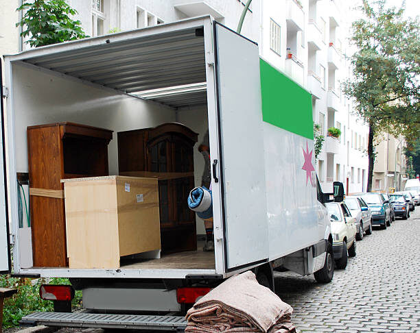 moving van with boxes and furniture
