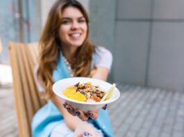 healthy breakfast hands young woman sitting chair 197531 402