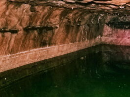 ancient therapeutic pool dug inside a salt mine in khewra, pakistn